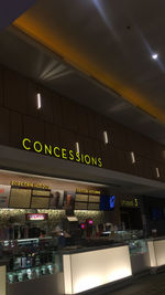 Low angle view of information sign at airport