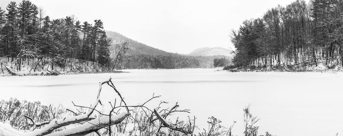 Scenic view of frozen lake against sky