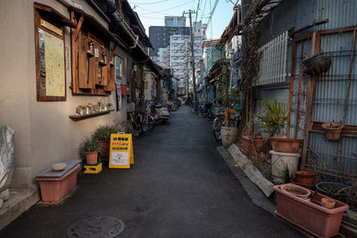 Street amidst residential buildings