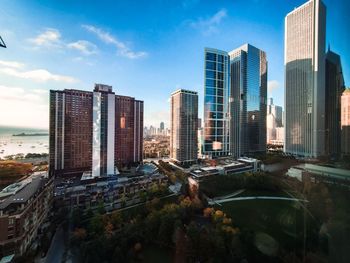 Panoramic view of modern buildings against sky in city