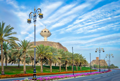 Street light by road against sky