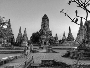 View of temple against building