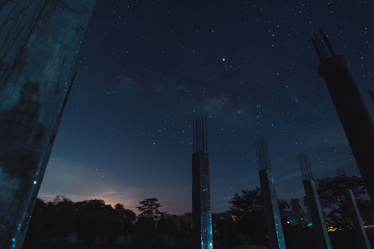 LOW ANGLE VIEW OF STAR FIELD AGAINST SKY AT NIGHT