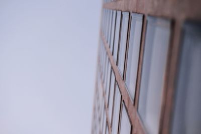 Low angle view of metallic structure against clear sky