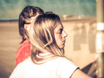 Close-up of female friends during sunny day