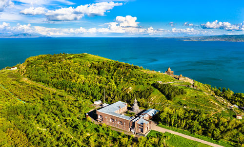 Aerial view of seascape by land