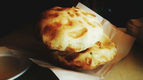 Close-up of breads on table