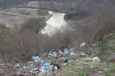 High angle view of garbage by plants