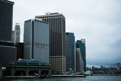 Modern buildings in city against sky