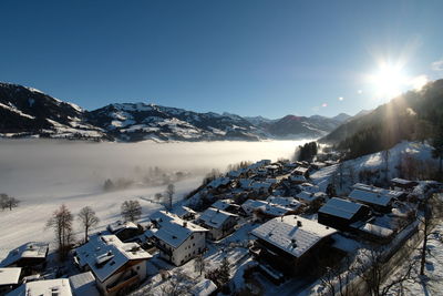 Scenic view of snowcapped mountains against sky during winter