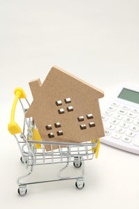 Close-up of objects on table against white background