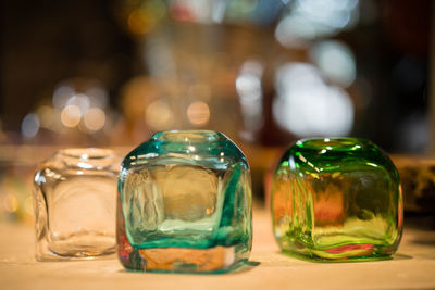 Close-up of glass cubes on table