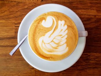 High angle view of cappuccino on table