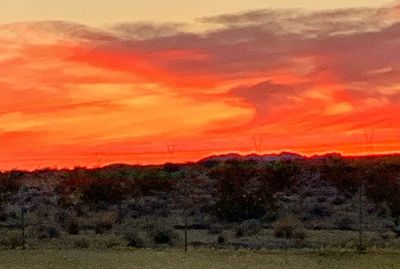 Scenic view of dramatic sky during sunset