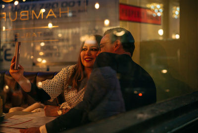 Rear view of people at nightclub