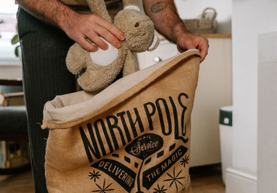 Midsection of woman with dog