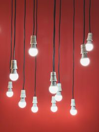 Close-up of illuminated light bulb