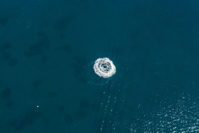 High angle view of bubbles over sea