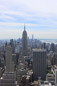 Manhattan view with empire state building and one world trade center from rockefeller center 