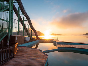 Water slide on the beach, romantic morning walk in holiday resort