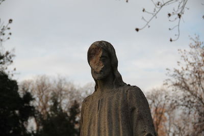 Low angle view of statue against sky