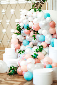 High angle view of multi colored candies in container on table