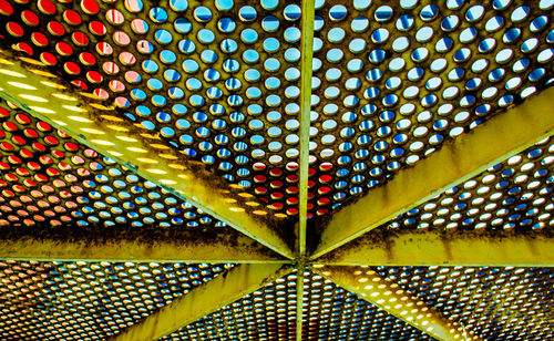 Low angle view of illuminated ceiling