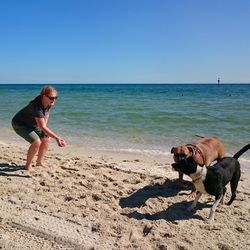 Woman standing on beach
