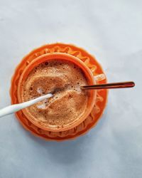 High angle view of coffee cup on table