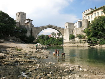 Arch bridge over river