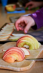 Sliced apples on cutting board