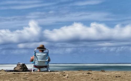Rear view of horse on beach