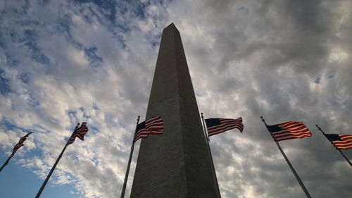 Low angle view of flag against sky