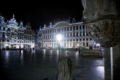 View of fountain in city at night