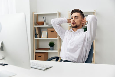 Portrait of businessman working in office