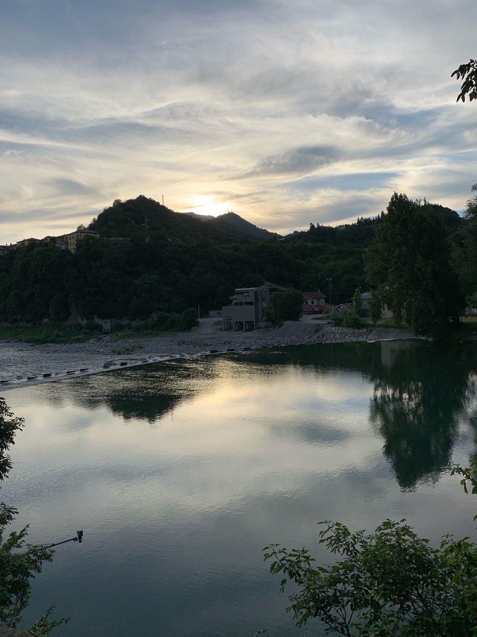 SCENIC VIEW OF LAKE BY TREES AGAINST SKY