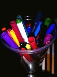 Close-up of multi colored pencils in container