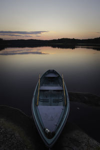 Reflection of clouds in lake at sunset