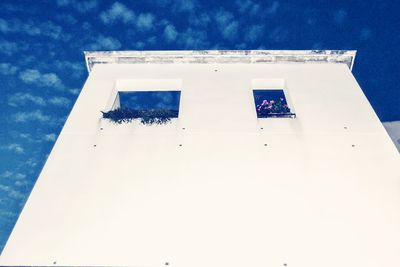 Low angle view of built structure against blue sky