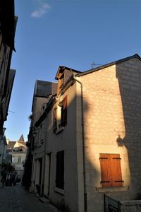 Low angle view of buildings against clear sky