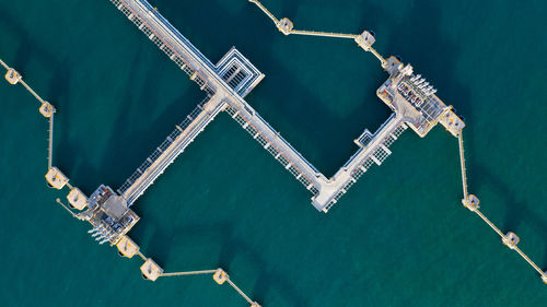 High angle view of commercial dock against sea