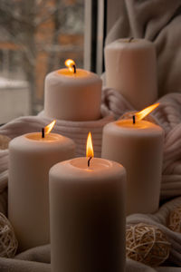 Close-up of illuminated candles