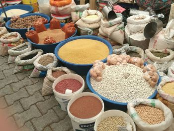 High angle view of various grains for sale at market stall