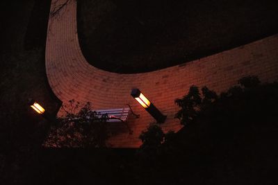 High angle view of illuminated lighting equipment on tree at night