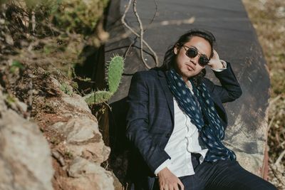 Young man posing outdoors