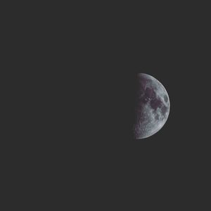 Low angle view of moon against sky at night
