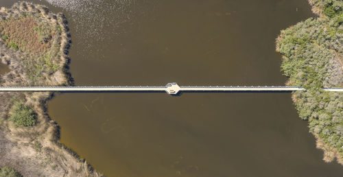 High angle view of trees by lake