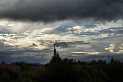 Built structure against cloudy sky