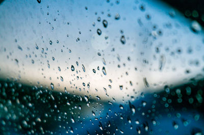 Full frame shot of wet glass window