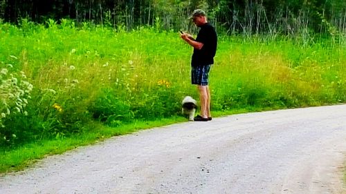 Full length of woman standing on grass